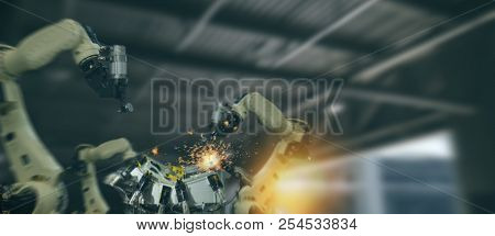 Iot Industry 4.0 Technology Concept.smart Factory Using Trending Automation Robotic Arms With Part O