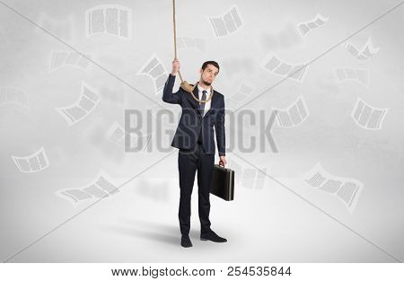 Young burnout businessman with flying documents concept