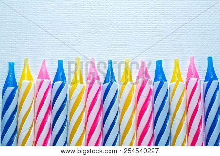 Macro Closeup Of Decorative Colored Candles For Birthday