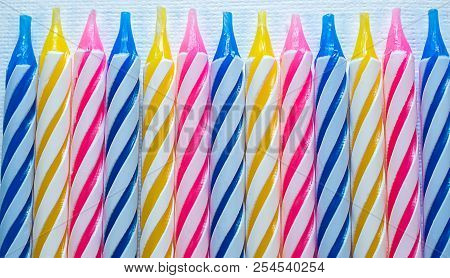 Macro Closeup Of Decorative Colored Candles For Birthday