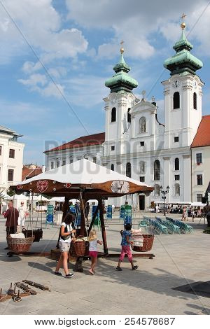 Gyor, Hungary - August 10, 2012: People Visit Old Town In Gyor, Hungary. In 2011 Tourism Receipts In