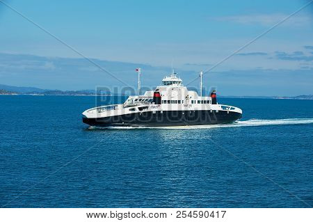Tveit, Norway - June 06, 2010: Ferry Boat Arrives To The Port In Tveit, Norway.