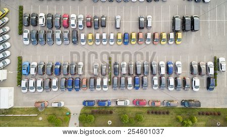 Parking Lots, Top View. Aerial View Of A Colorful Cars Parked In A Parking.