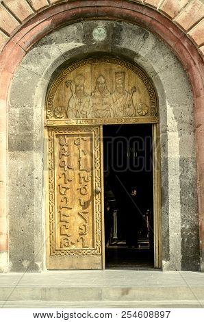 Oshakan,armenia,19 Februar,2018: Entrance Doors With Armenian Alphabet On The Facade Of The Church O