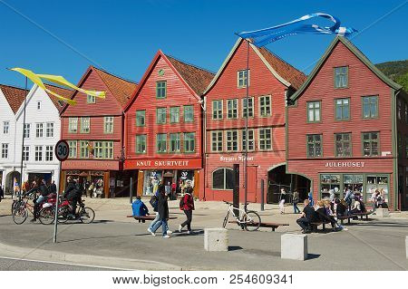 Bergen, Norway - June 06, 2010: Unidentified People Walk At Bryggen Historical Quarter In Bergen, No