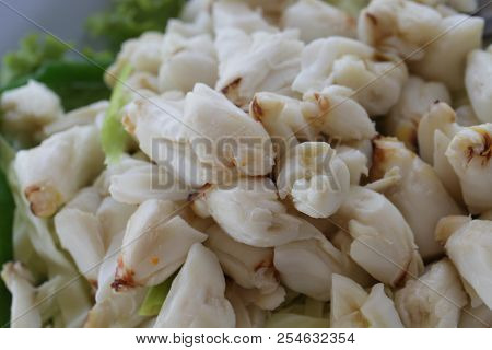 Full Plate Of Fresh Crab Meat Of Boiled Stone Crab Decorated With Vegetable Side Dish, Cheliped Of T