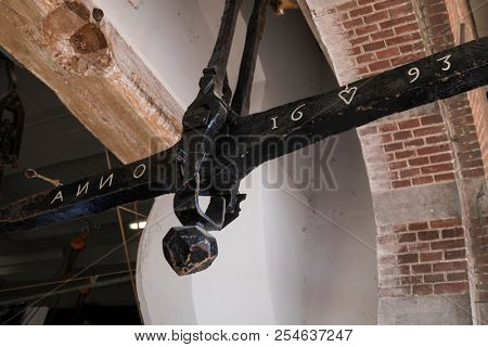 Alkmaar, Netherlands - July 20, 2018: Antique cheese scale in the Waag buiding on the cheese market in Alkmaar  dated 1693  