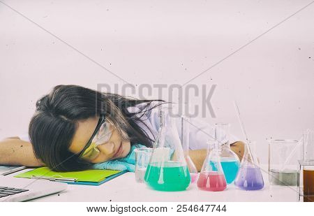 The Abstractart Design Background Of The Chemist In Protective Eyeglasses Working By Test Tube With 