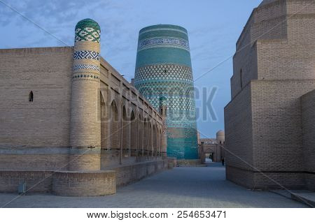 The View On Kalta Minor Minaret In Early Morning From Streets Of Khiva, Uzbekistan