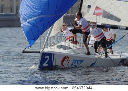 ST. PETERSBURG, RUSSIA - AUGUST 3, 2018: Team SCTWV Achensee from Austria compete in Semifinal 2 of Sailing Champions League. 25 sailing teams participate in the competitions