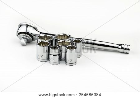 A Shiny, Silver, Chrome Socket Wrench Set With Sae, Standard American Equivalent, Fractional Sockets