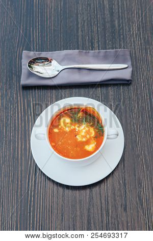 Traditional Russian Solyanka With Cream On A Wooden Table. Solyanka Soup With Cream.