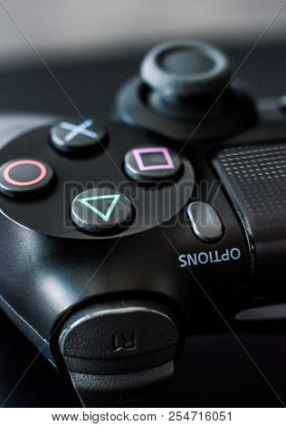 Khakiv, Ukraine - 02 May 2018: Close-up of black authentic dualshock game controller. Sony Playstation PS gamepad