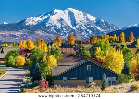Residential neighborhood in Colorado at autumn, USA. Mount Sopris landscape.