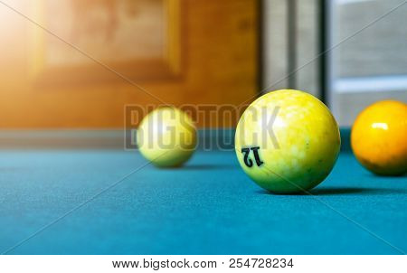 Billiard Table Close Up. Playing Billiard. Billiards Balls And Cue On Green Billiards Table. Billiar