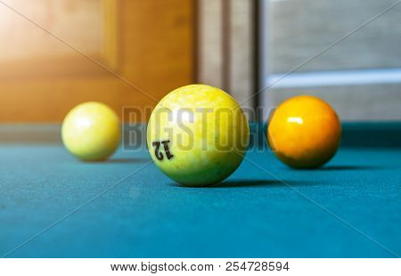 Billiard Table Close Up. Playing Billiard. Billiards Balls And Cue On Green Billiards Table. Billiar