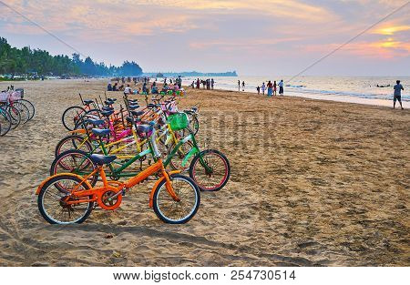 Bike Ride Along The Beach Is Traditional Burmese Time Spending, People Often Rent The Cycles On Coas