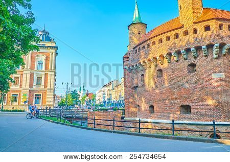 Krakow, Poland - June 11, 2018: The Medieval Defensive Barbakan Structure Nowadays Located In The Mi