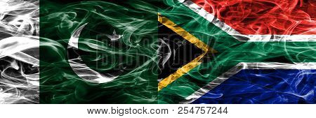 Pakistan Vs South Africa Smoke Flags Placed Side By Side. Thick Colored Silky Smoke Flags Of Pakista