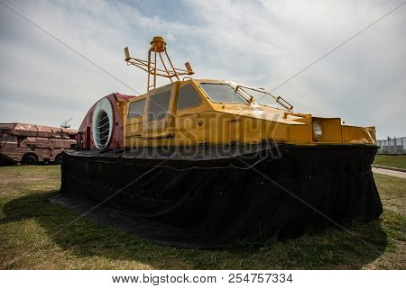 Russia, Togliatty - August 13, 2018: Yellow Hovercraft In The Open Air In The Summer, In The Museum