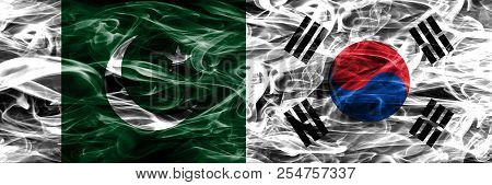 Pakistan Vs South Korea Smoke Flags Placed Side By Side. Thick Colored Silky Smoke Flags Of Pakistan
