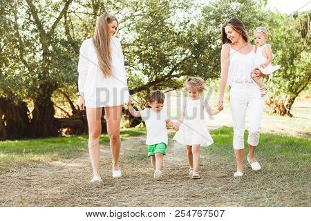 A Large Family With Homosexual Parents. Two Mothers.