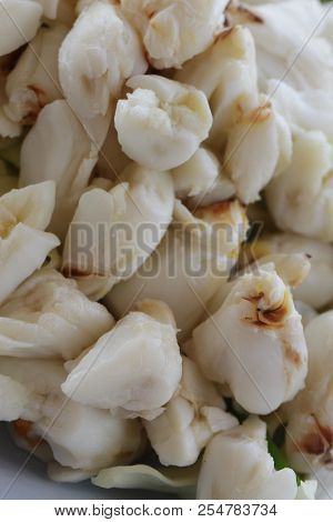 Full Plate Of Fresh Crab Meat Of Boiled Stone Crab Decorated With Vegetable Side Dish, Cheliped Of T