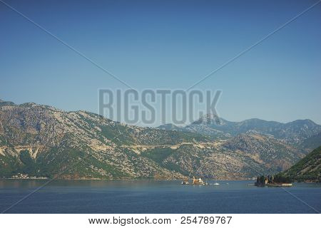 Boko-kotorska Bay In Montenegro. Epic View Of The Island Of Saint George Island And The Roman Cathol
