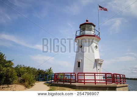 Michigan Lighthouse. Lighthouse On The Lake Huron Coast On The Downtown Waterfront Beach Of Cheboyga