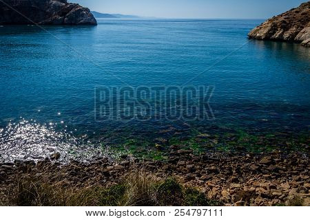 Jebha Island And Waves And Rocks