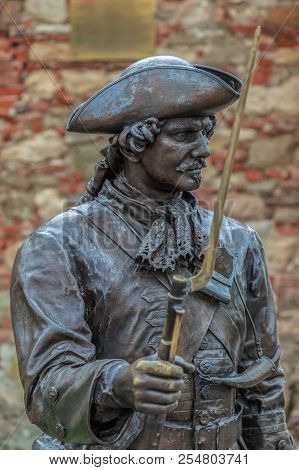 Alba Iulia, Romania - April 29, 2017: Bronze Statue With Old Soldier In Citadel Of Alba Iulia City.