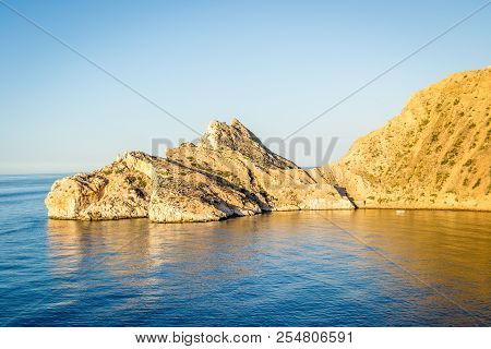 Jebha Island And Waves And Rocks