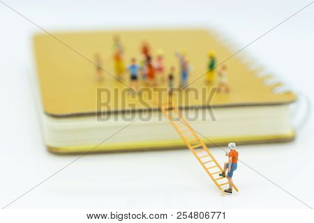 Miniature People: Child Support And Scholarships For Underprivileged Children. Image Use For Educati