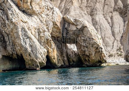 Jebha Island And Waves And Rocks