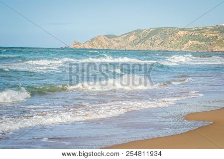 Saaidia Harbor And Waves And Rocks