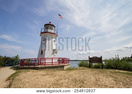 Michigan Lighthouse. Lighthouse On The Lake Huron Coast On The Downtown Waterfront Beach Of Cheboyga