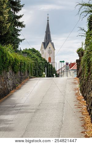 Town Road Leading To The Old Catholic Church In The Historical Centre Of The Town Of Ybbs An Der Don