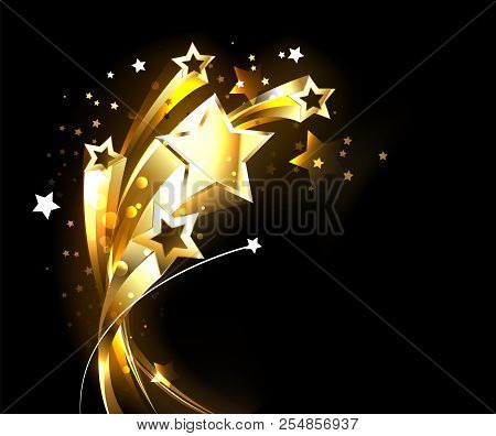 Five Soaring, Golden, Shining Stars On Black Background.