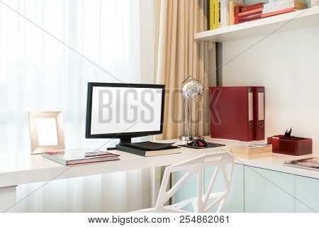Computer Display And Office Tools On Desk In Home. Desktop Computer Screen Isolated. Modern Creative