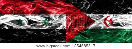 Syria Vs Sahrawi Smoke Flags Placed Side By Side. Thick Colored Silky Smoke Flags Of Syrian And Sahr