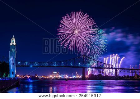 Fireworks Display Over City Bridge In Montreal Canada