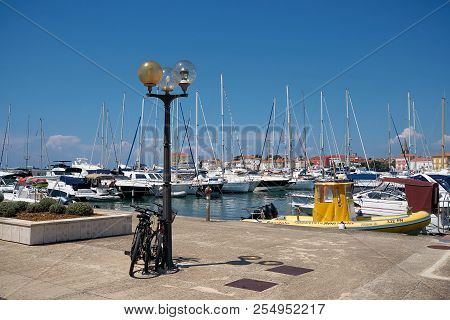 Porec, Croatia - July 22, 2018: View Of The Marina In Porec In Croatia With The Popular Promenade