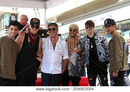 LOS ANGELES - AUG 22:  CNCO, Simon Cowell at the Simon Cowell Star Ceremony on the Hollywood Walk of Fame on August 22, 2018 in Los Angeles, CA