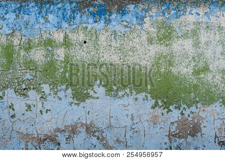 Aged Blue Green Painted Cracky Concrete Wall
