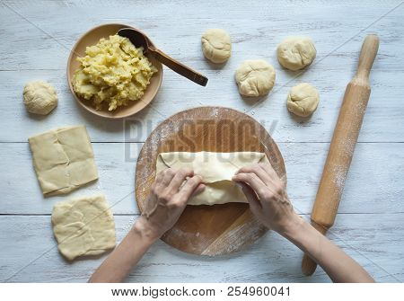 Cooking Traditional Pies With Potatoes. Placinta, Traditional Moldovan Pastries.