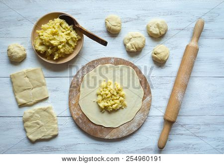 Cooking Traditional Pies With Potatoes. Placinta, Traditional Moldovan Pastries.