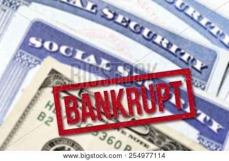 Social Security Cards representing Bankrupt System Loss of Money