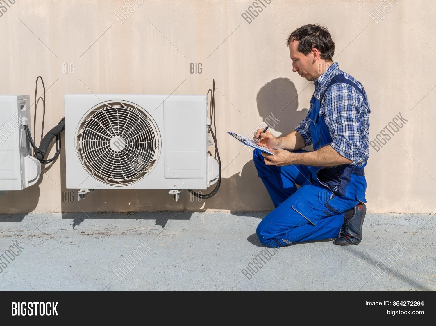 Man Doing Heating, Image & Photo (Free Trial) Bigstock