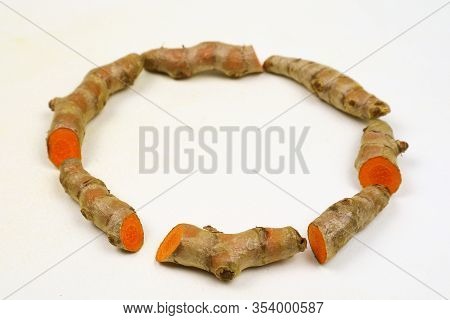 Fresh Turmeric Root Isolated On A White Background Is An Ingredient In Turmeric Foods And Ingredient