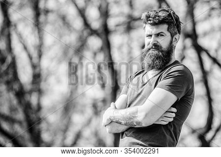 Masculinity And Manliness. Man Attractive Bearded Hipster Posing Outdoors. Confident Posture Of Hand